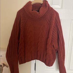 Brick red turtleneck sweater